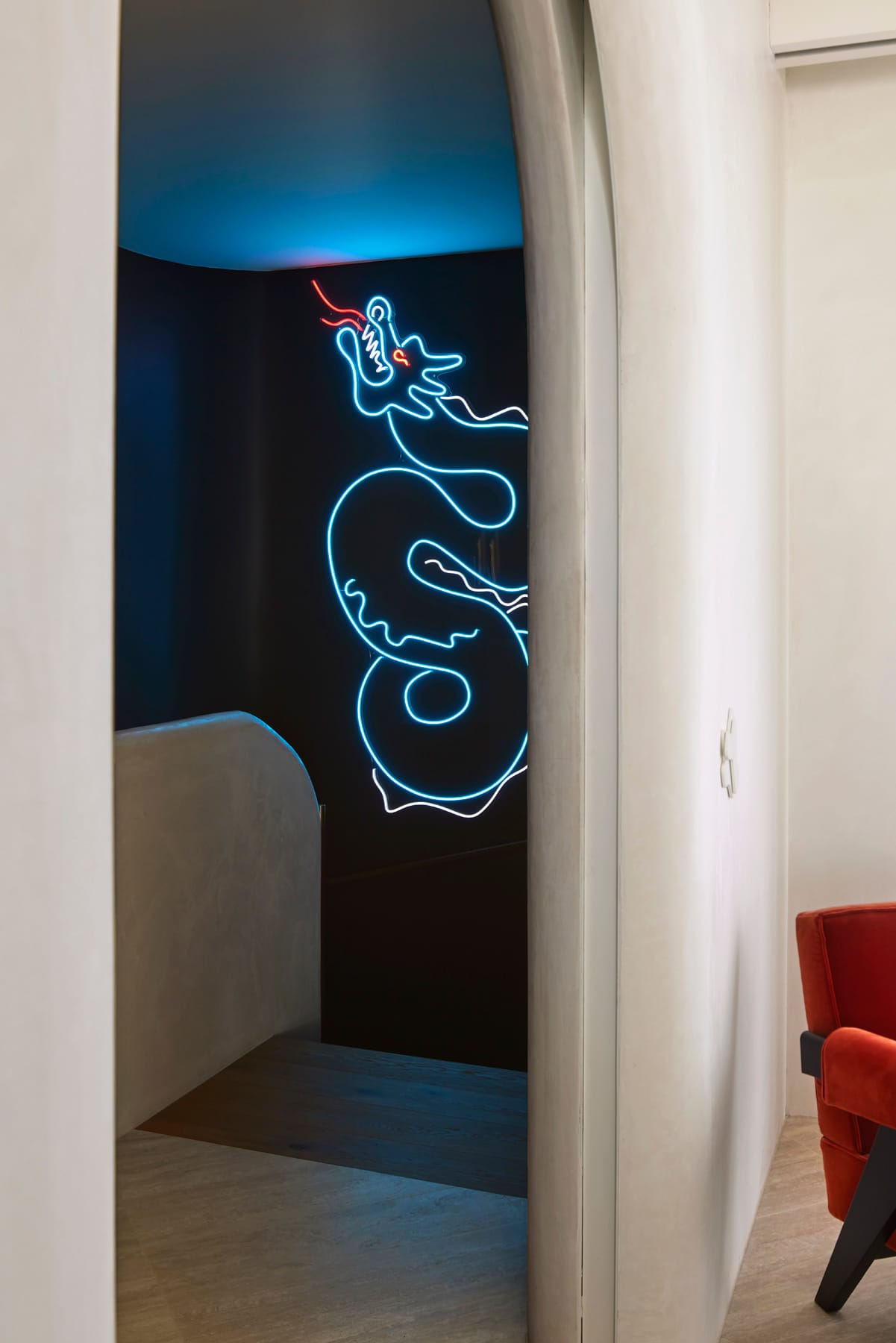 Toorak House 2 by K.P.D.O. Photography by Sharyn Cairns. Blue dragon LED wall art in stairwell. 