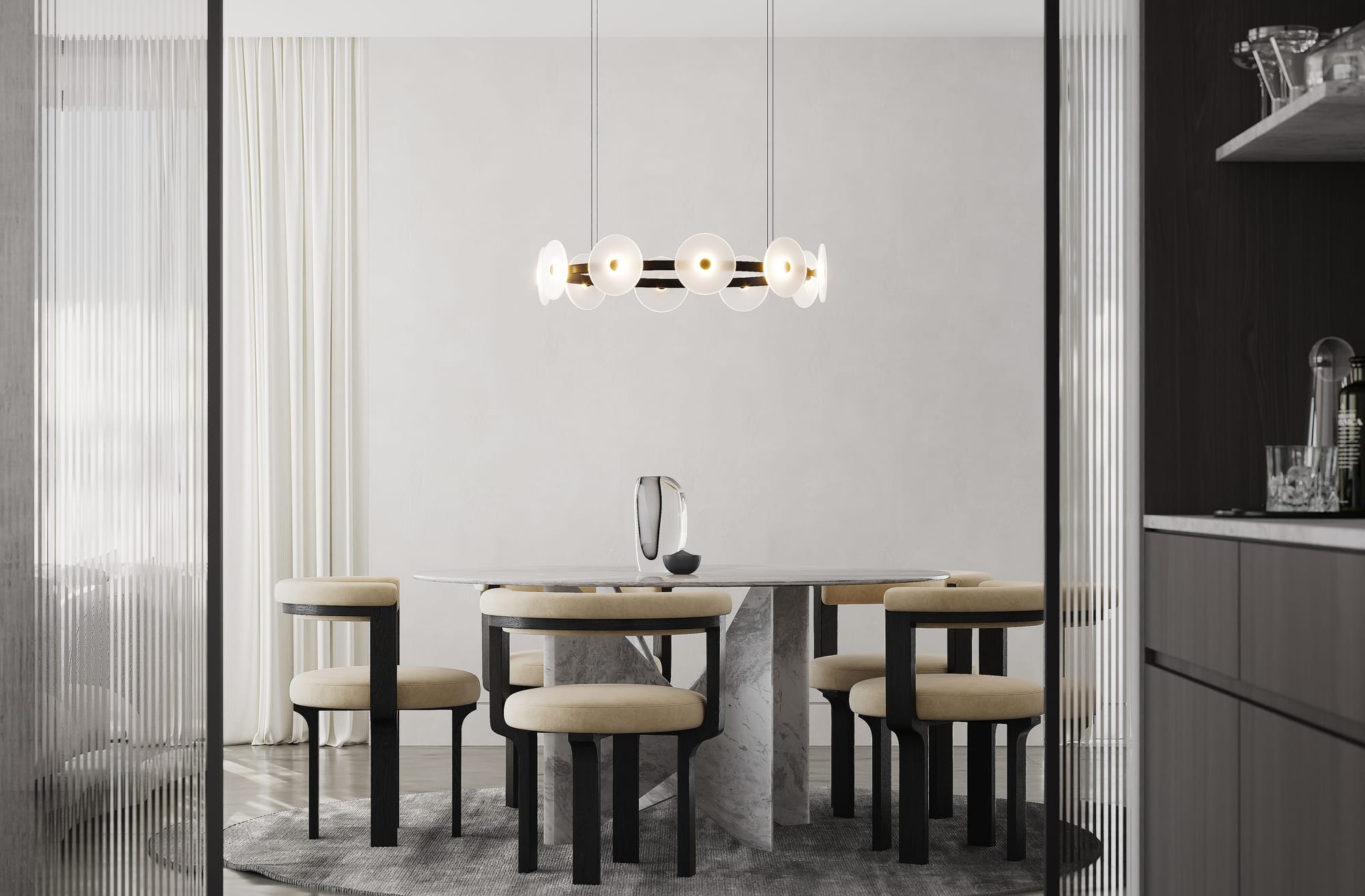 Coral Ring Pendant Light by SOKTAS. Copyright of SOKTAS. Circular pendant light hanging above round marble dining table with beige and black chairs. 