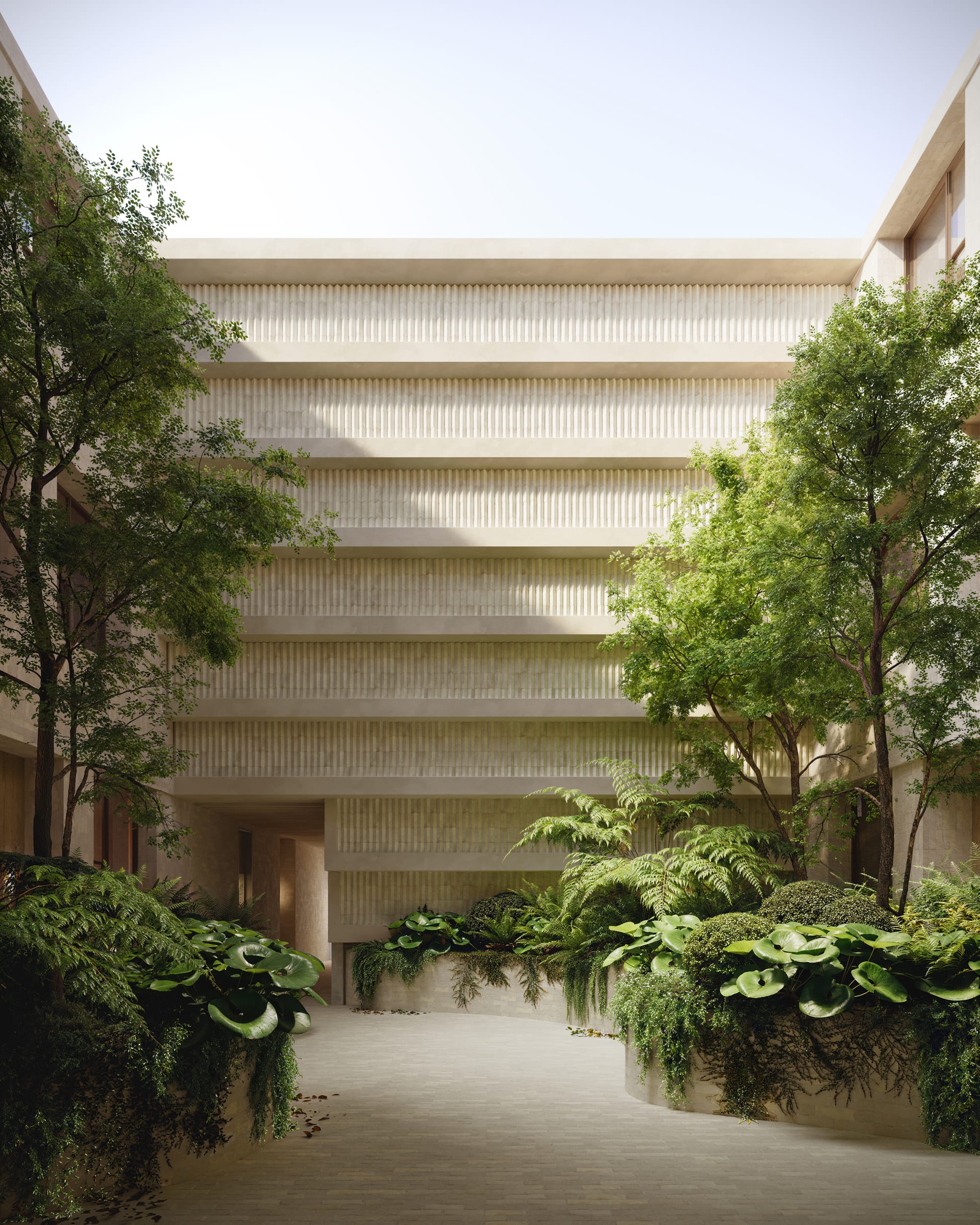 Fernhurst by ANGLE. Atrium with view on angled brick facade and greenery.