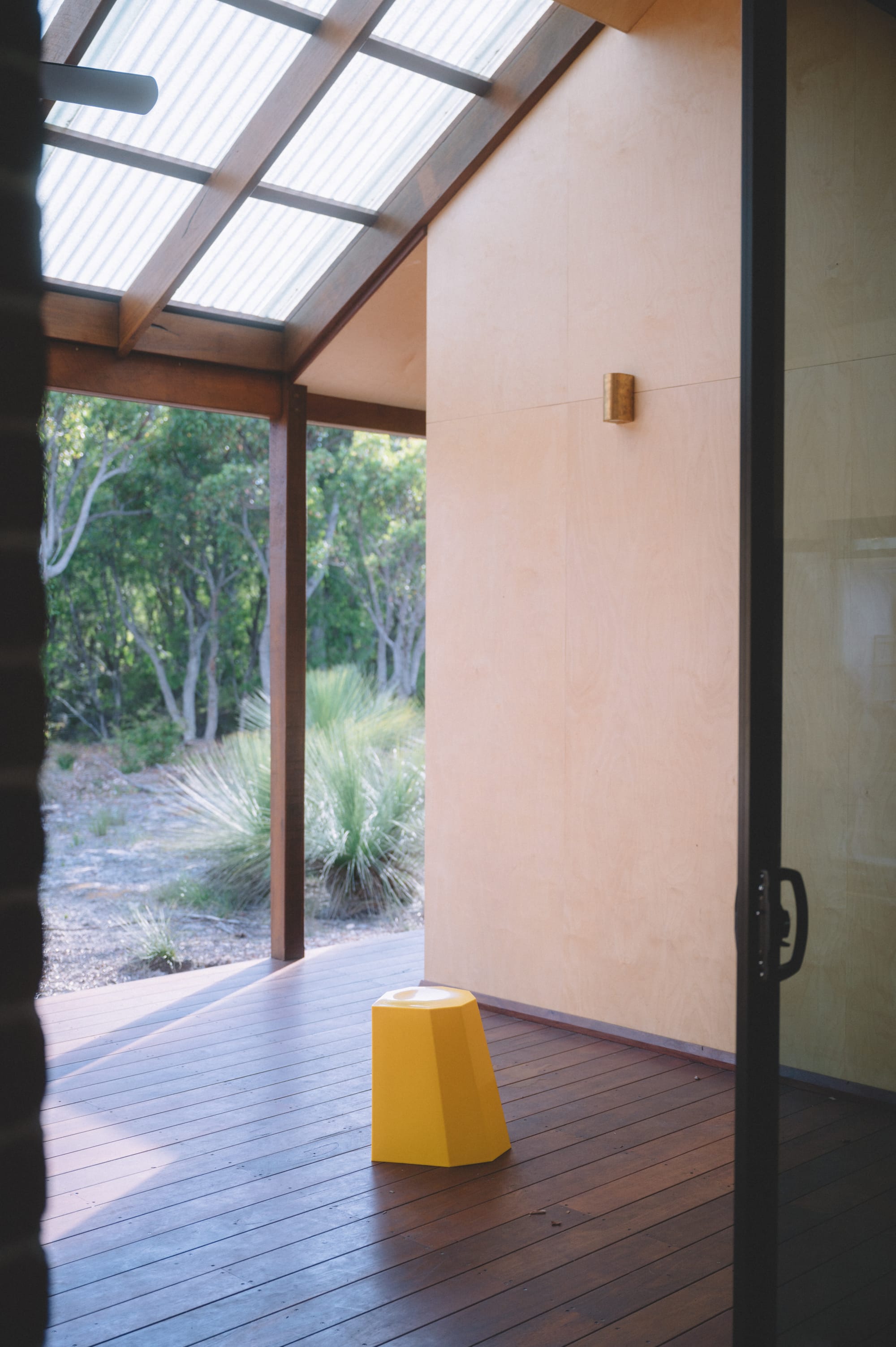 Nullaki House by Bare Architects. Floor to ceiling glass door with angled view to landscape.