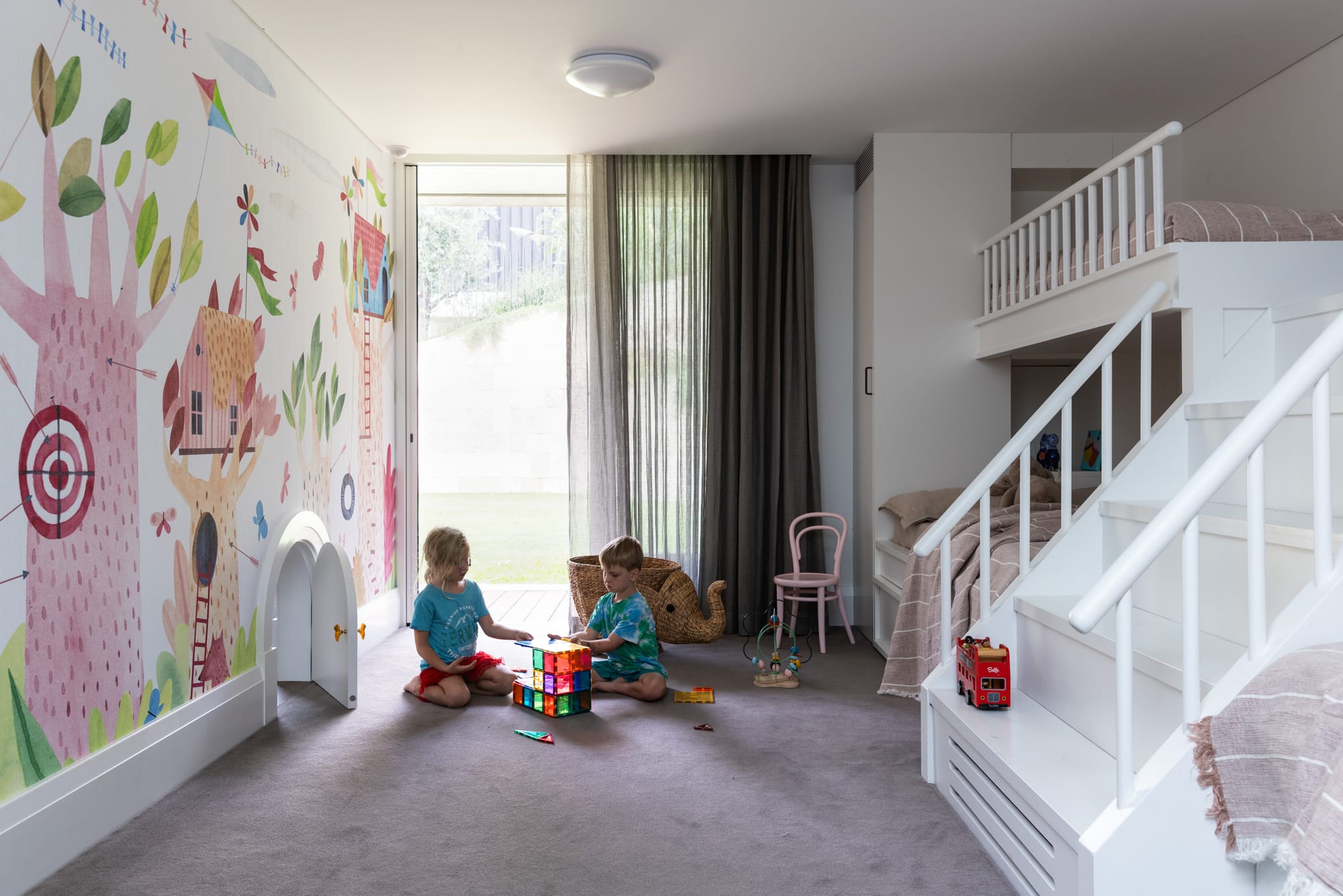 Ripple House by Marker Architecture. Kids room with art wall and bunkbeds.