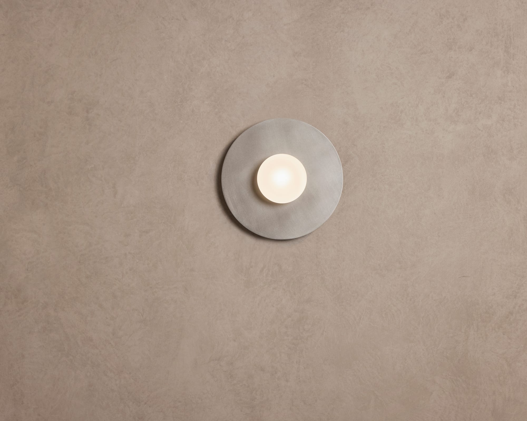 Globe Disc Wall Light by alt. Artefact. Silver brushed Globe Disc Wall Light.