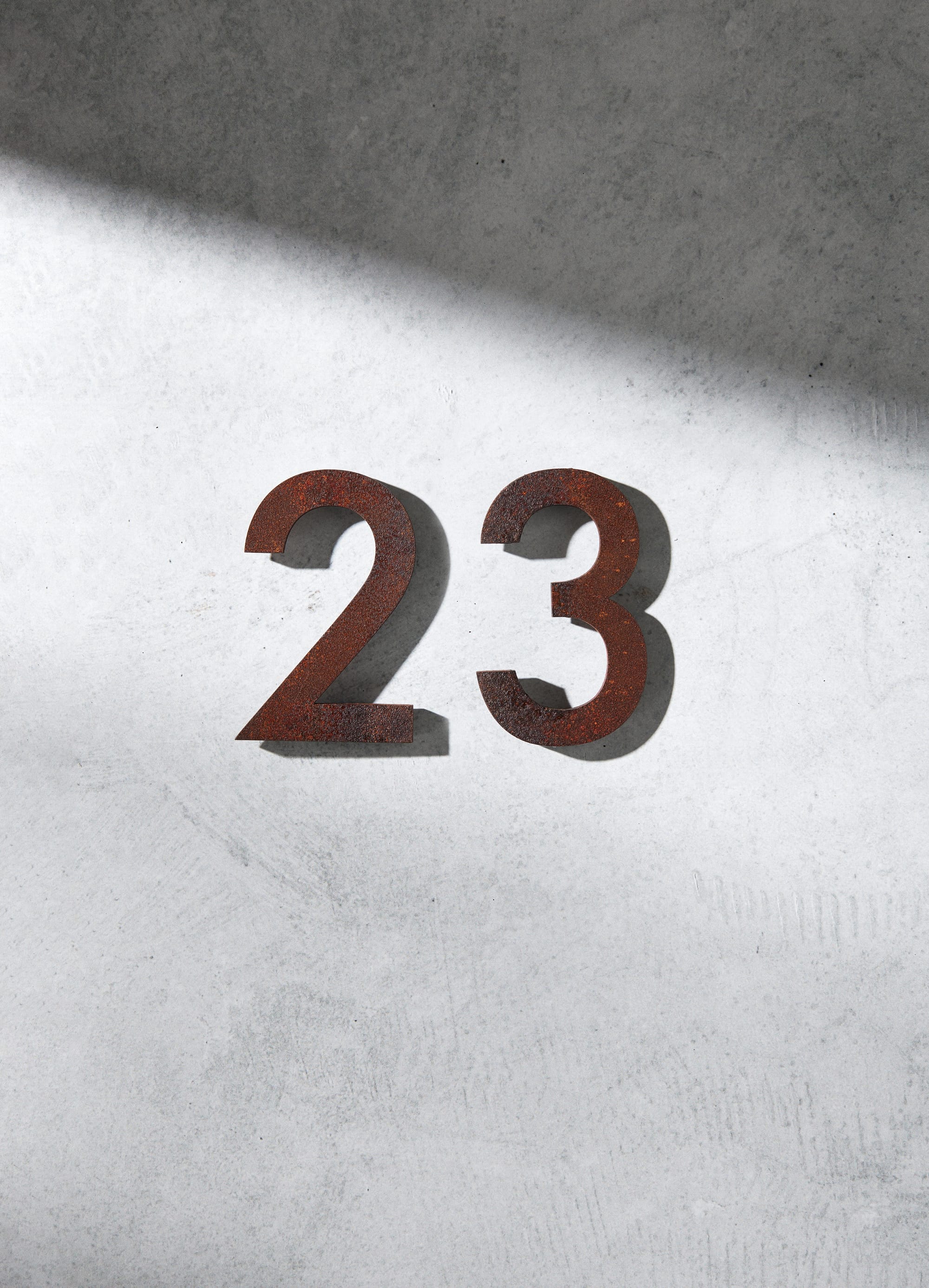 Outdoor Collection by Hibernate. Handcrafted, rusted steel mountable numbers. 