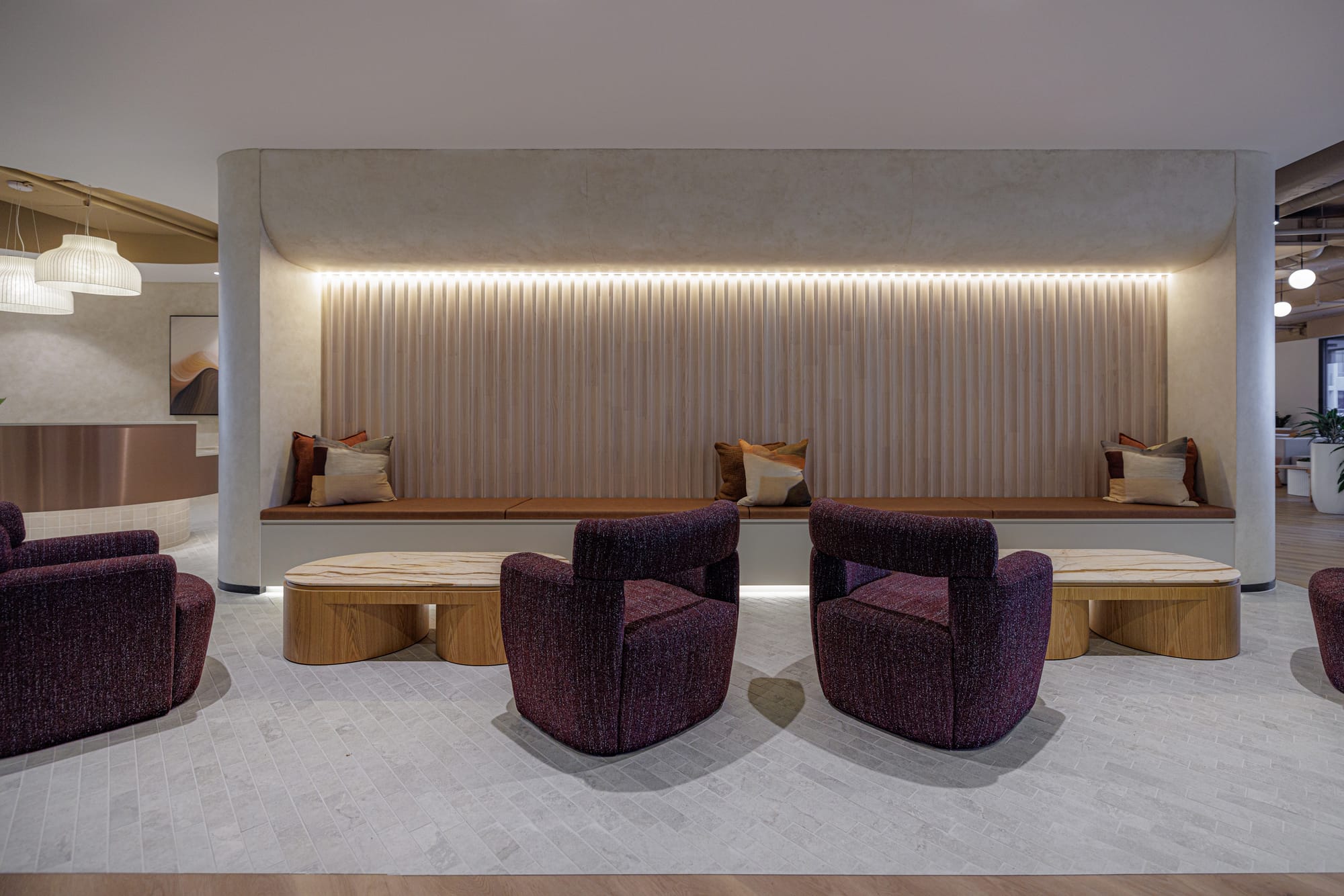 St Leonards Centuria Office Fit-Out by Alinea. Illuminated, customised reception desk featuring white ceiling lampshades.