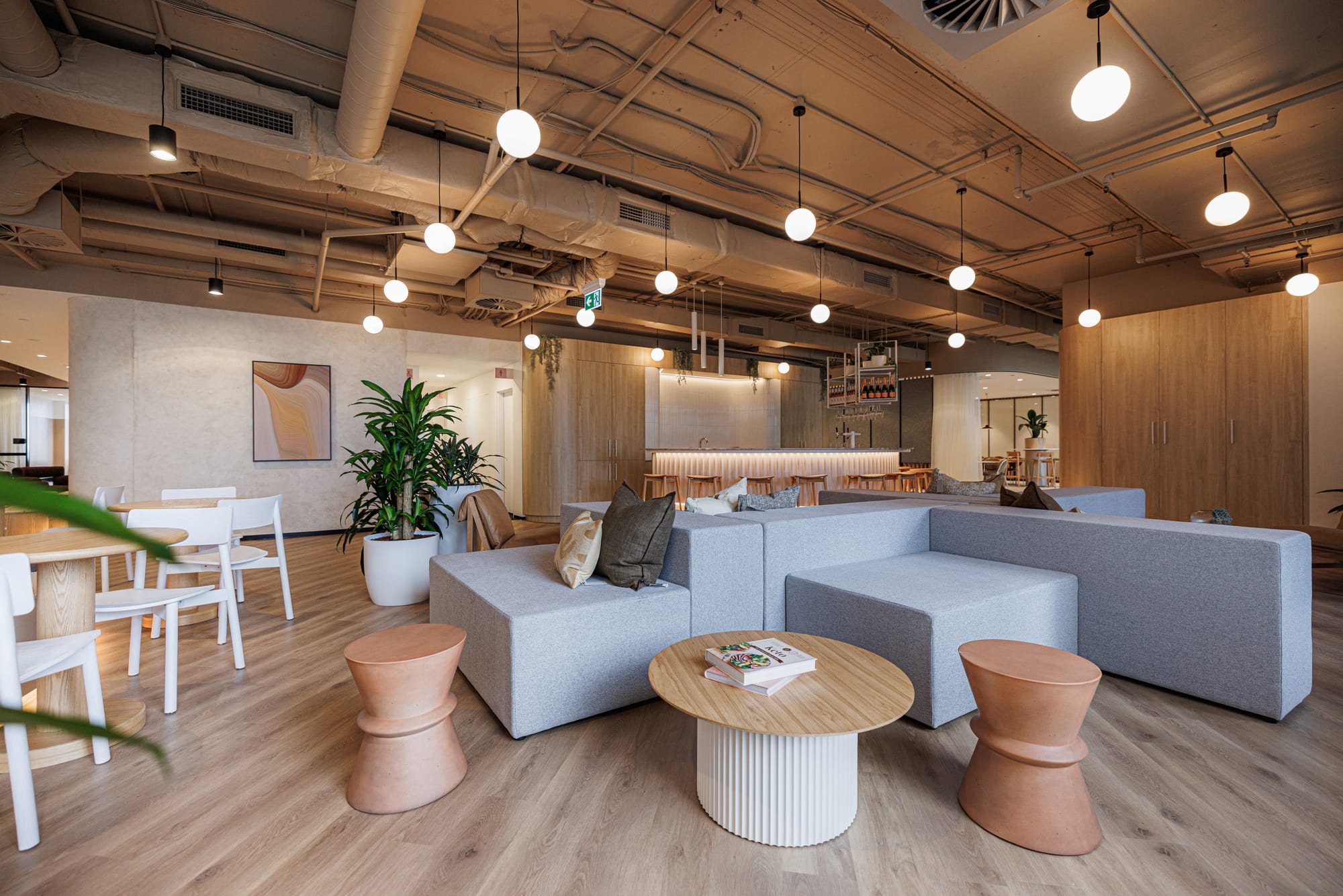 St Leonards Centuria Office Fit-Out by Alinea. View to office recreation room featuring different seating facilities.