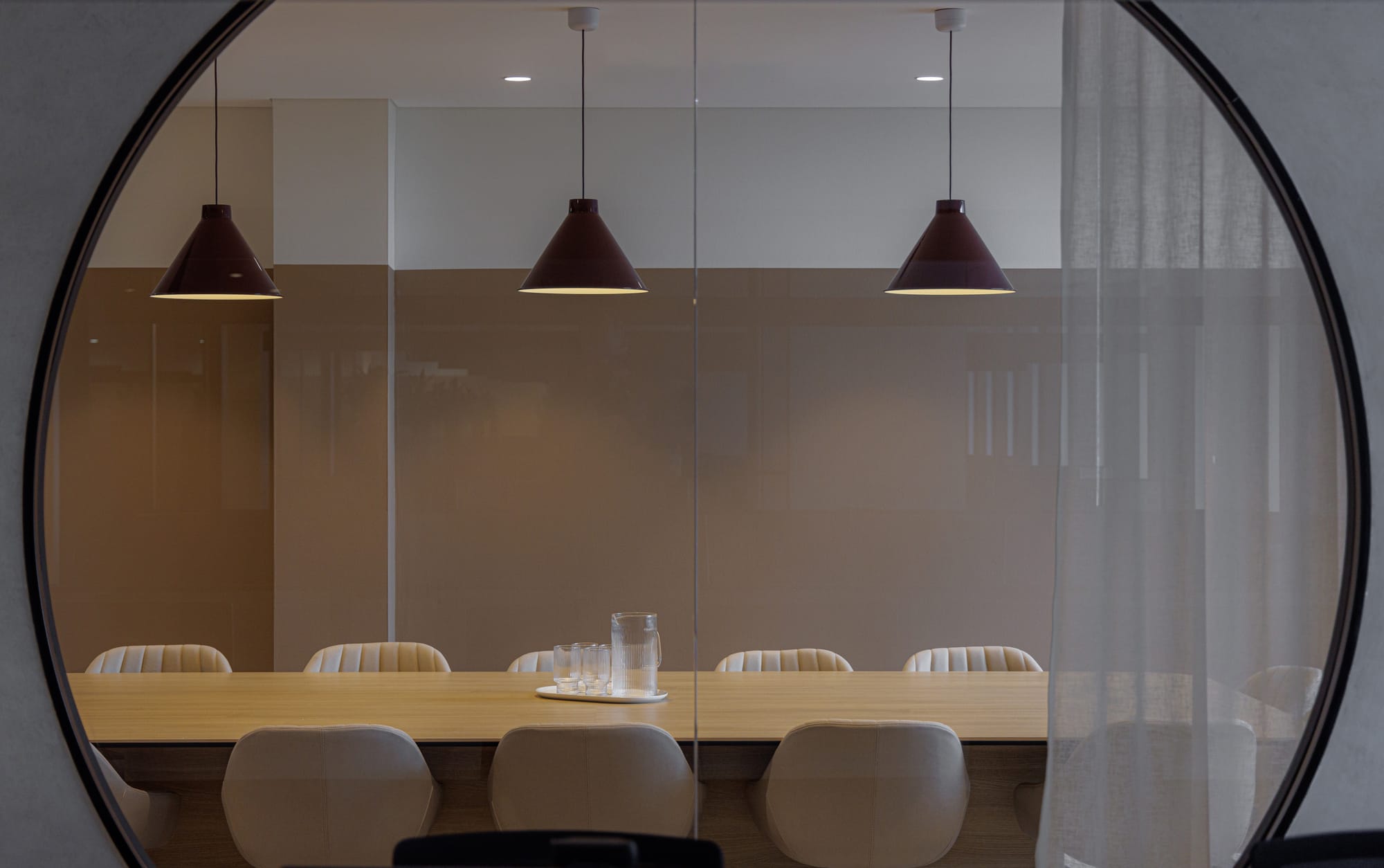 St Leonards Centuria Office Fit-Out by Alinea. Water dispenser detail of round shaped bar featuring customised shelving.