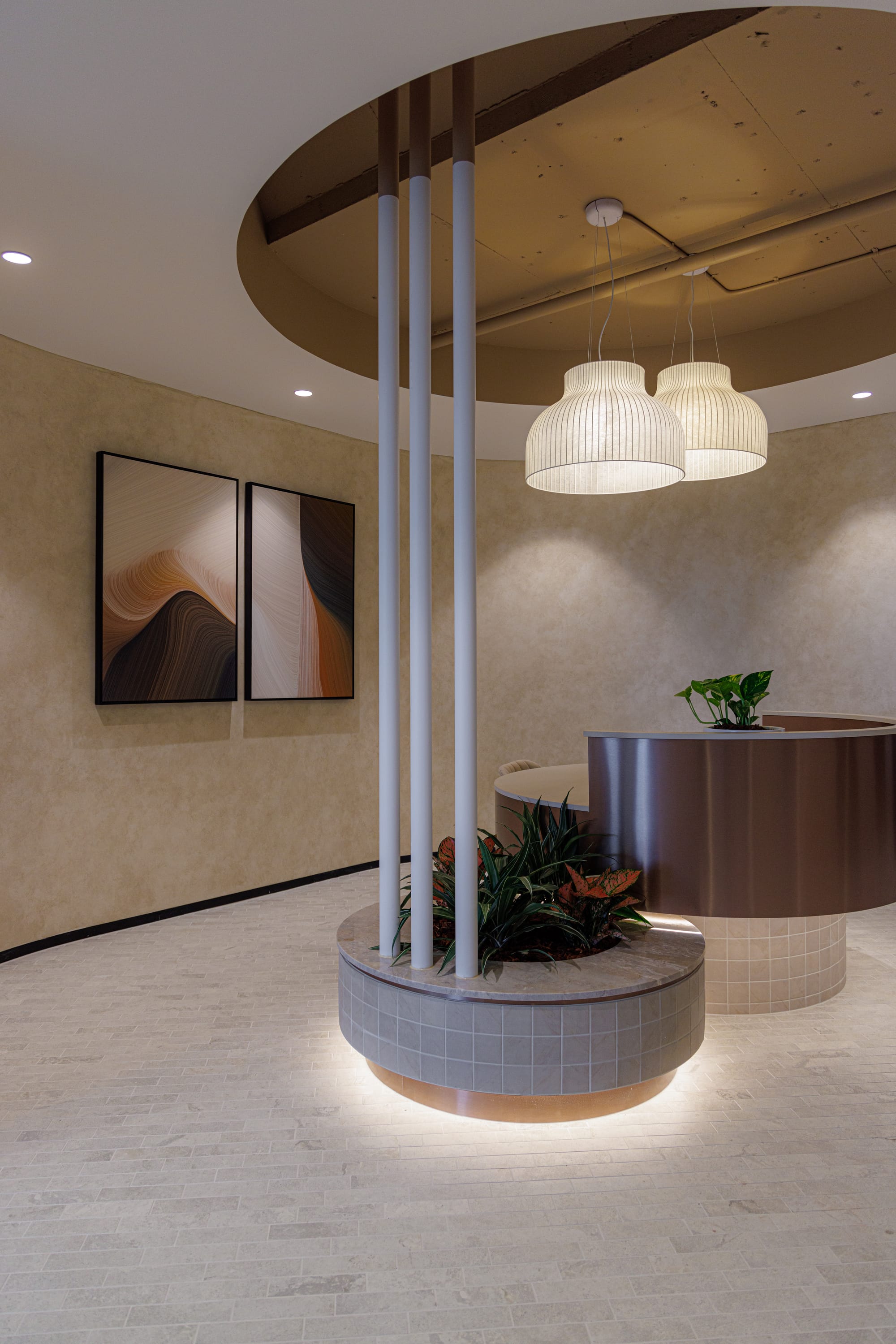 St Leonards Centuria Office Fit-Out by Alinea. Illuminated, customised reception desk featuring white ceiling lampshades.