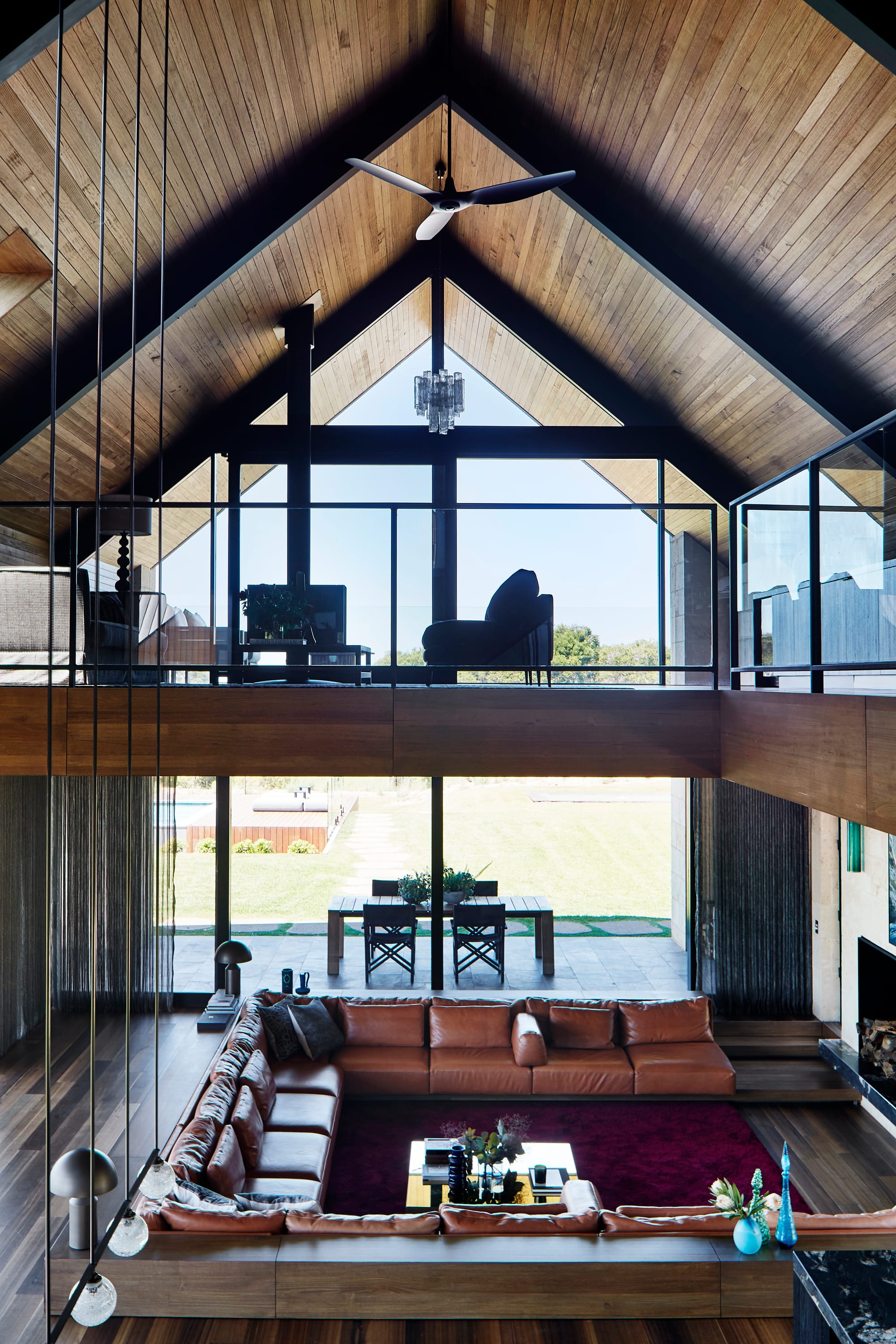 Flinders Residence by Abe McCarthy. Modern residence maisonette interior featuring gable roof, spacious living room and loggia.