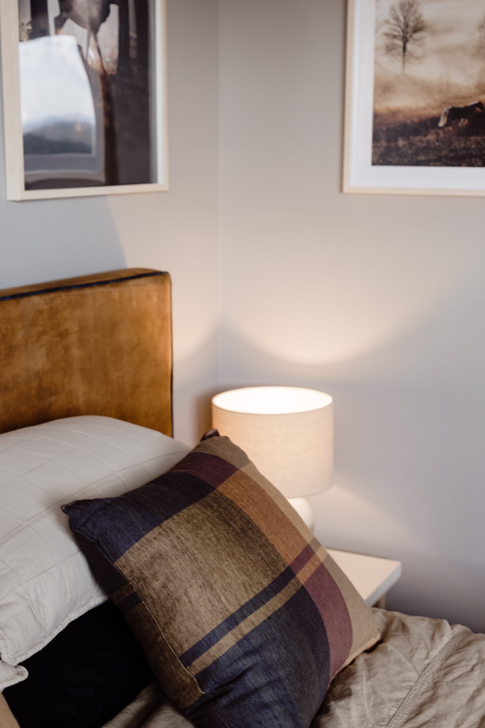 Roam Escape by Roam Merrijing. Bedroom detail featuring pillow case and small table light.