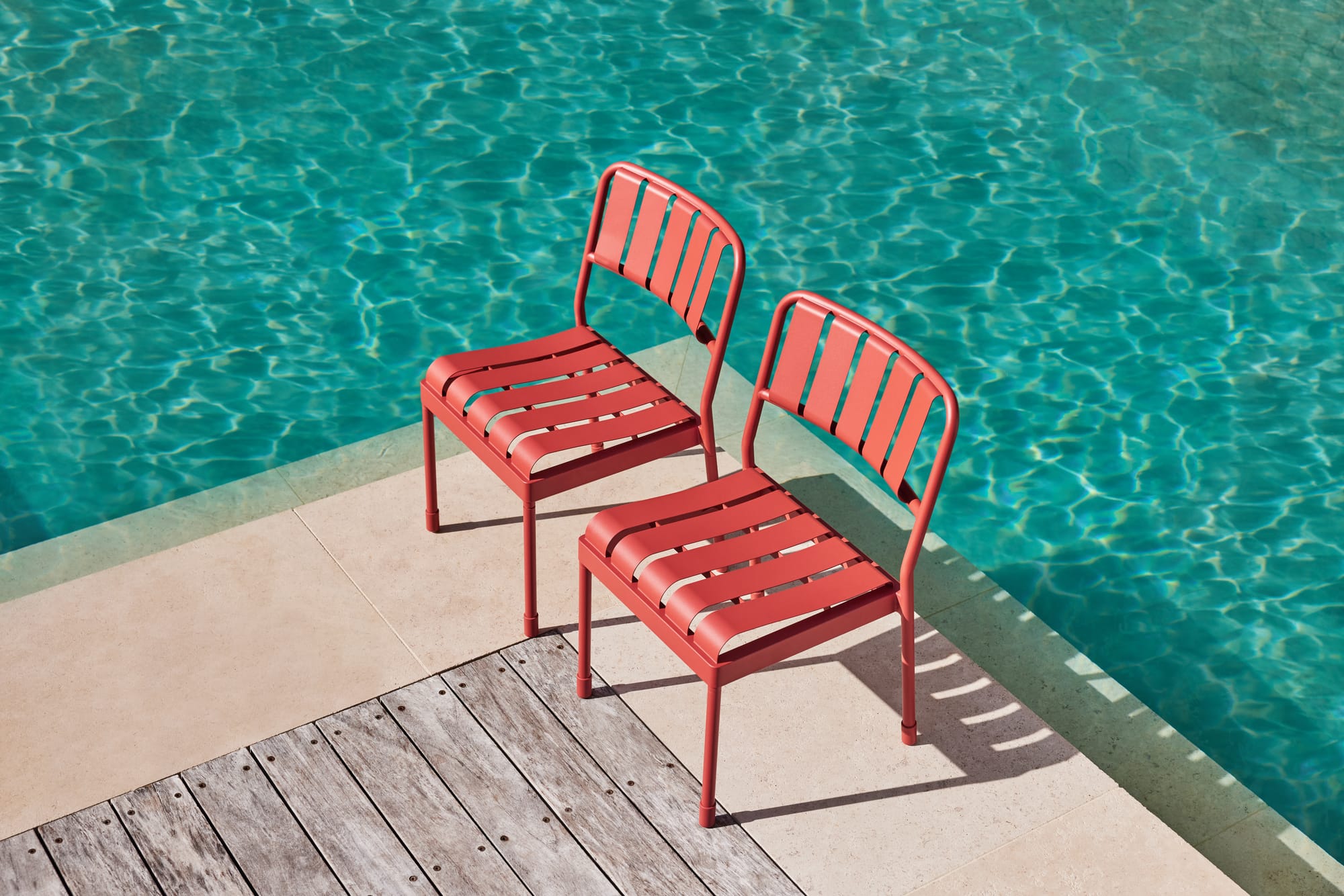 Torakina Outdoor by Koala Living. Dining Chairs featuring powder coated coral red steel construction in modest shaped design.