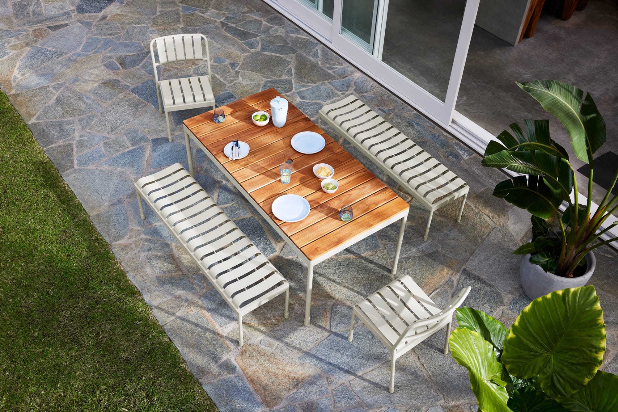 Torakina Outdoor by Koala Living. Outdoor Dining Set featuring dining table 4 seater benches and armchairs in light sand color.