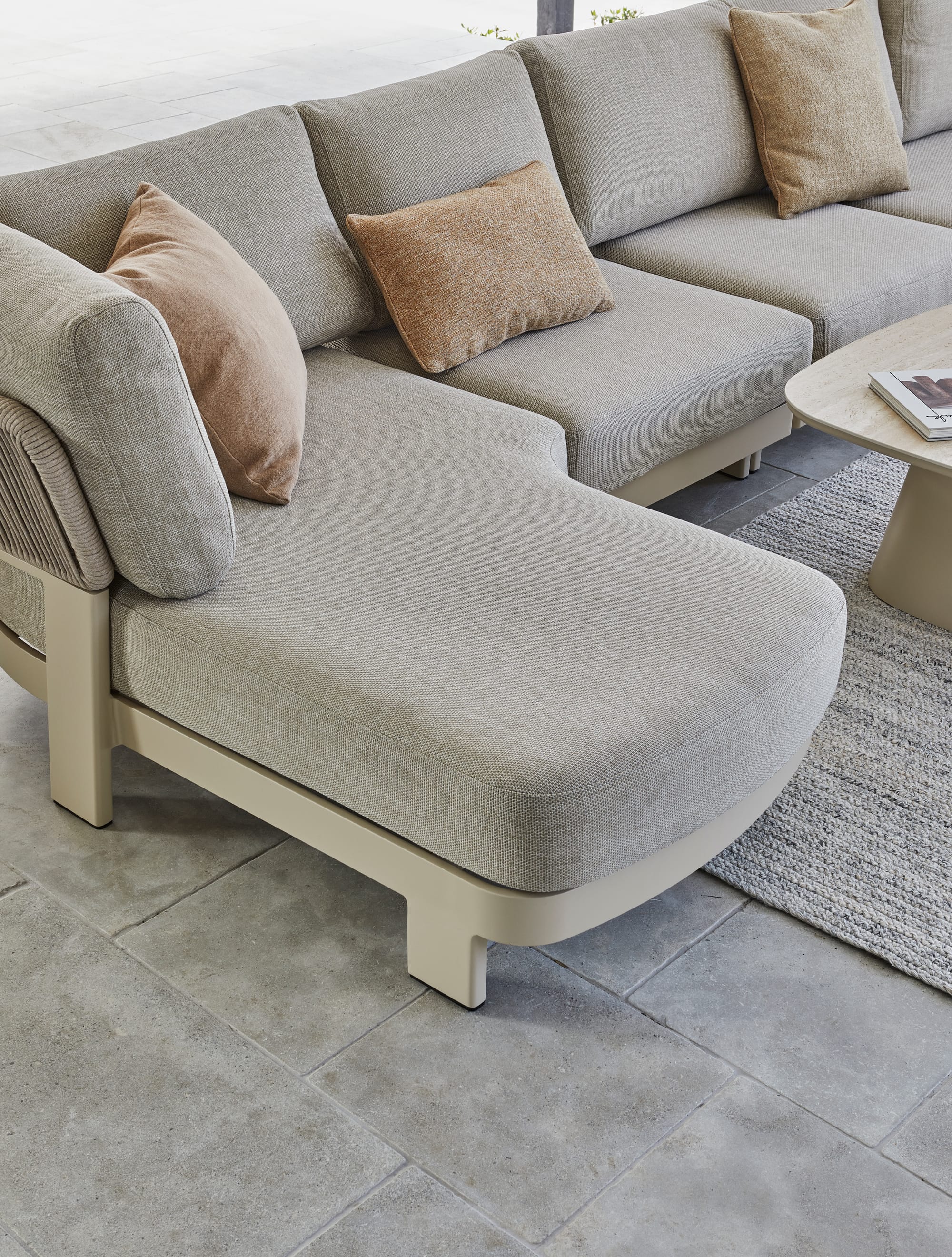 Valencia Rope Modular Sofa by GlobeWest. Modern sofa detail featuring sand coloured fabric and beige aluminum base.