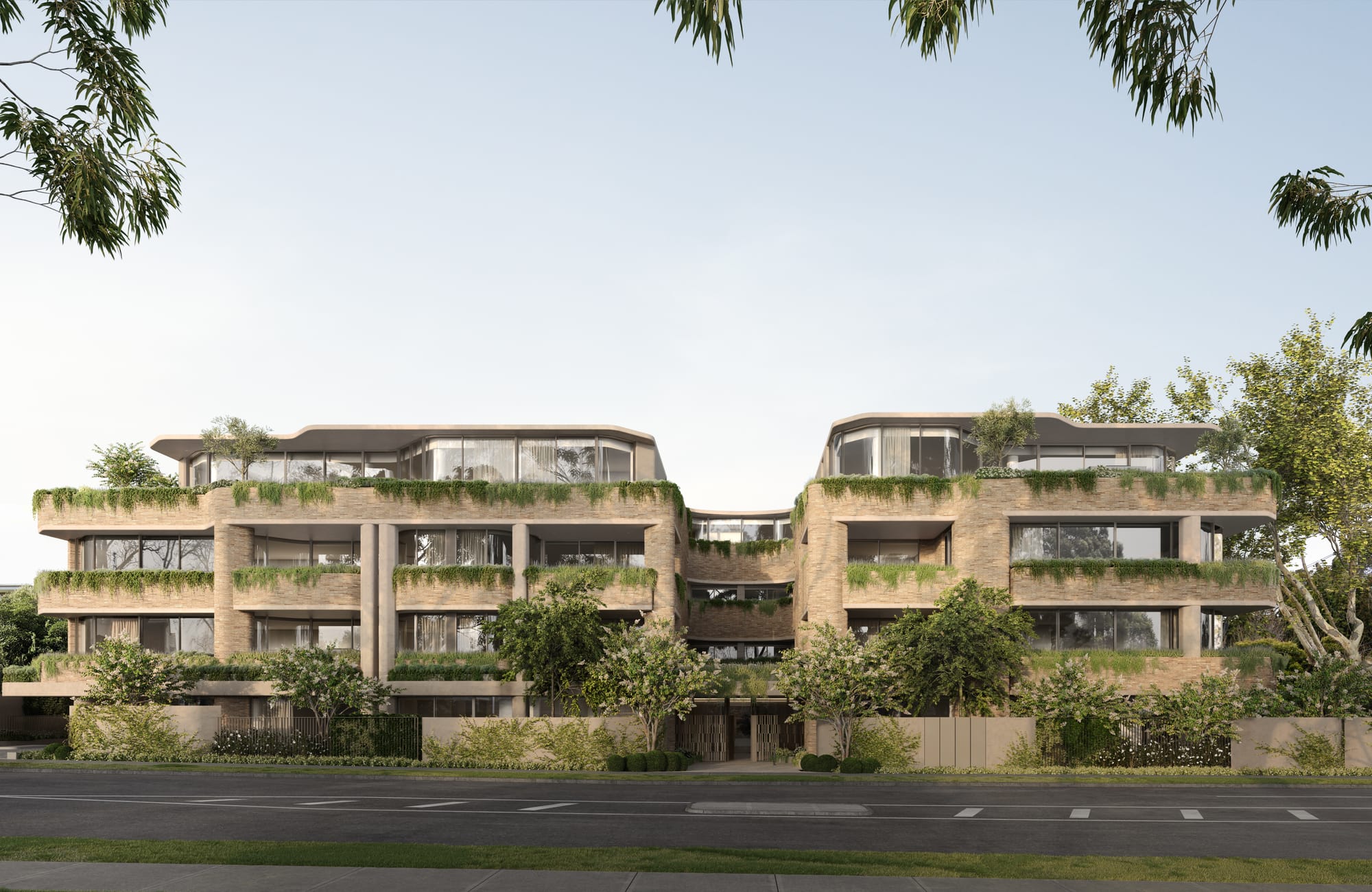 Como, Toorak by Prime Edition. View to modern beige brick façade featuring vegetated balconies and floor to ceiling windows.