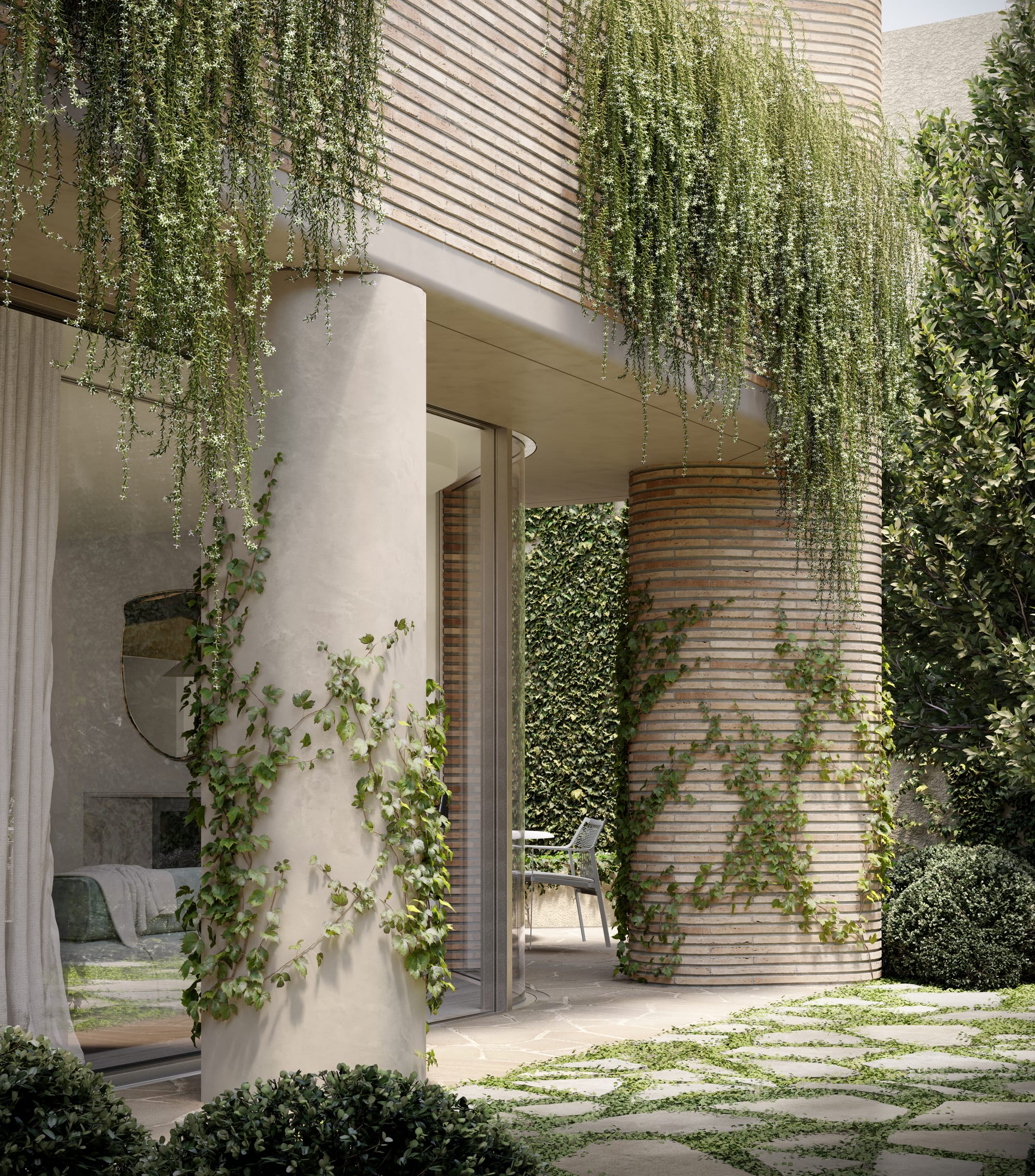 Como, Toorak by Prime Edition. View to rounded glass façade structure supported by concrete and beige brick pillars embedded in greenery.