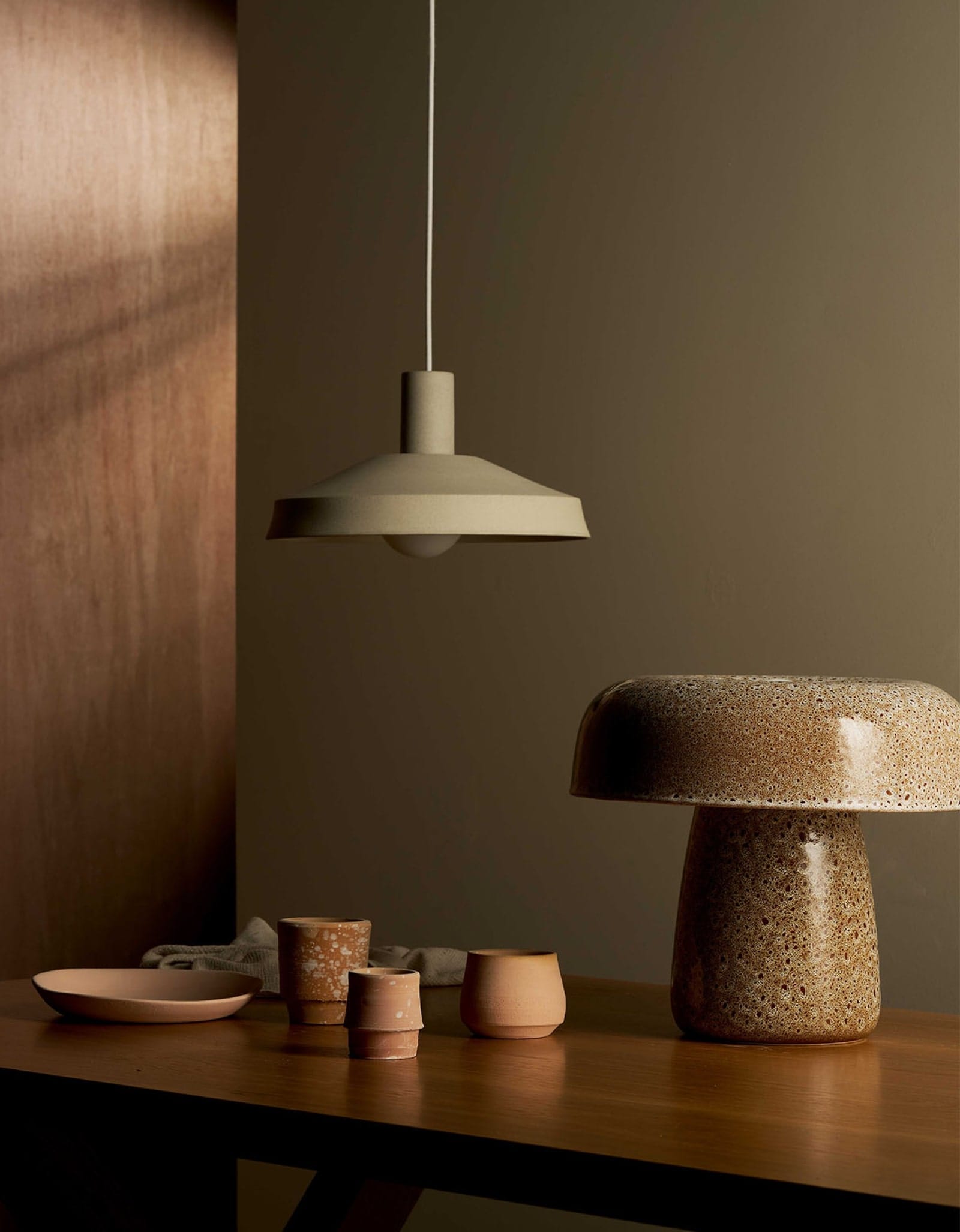 Tapa Pendant Light and Nest Table Lamp by Robert Gordon with Lighterior. Ceramic pendant light and Table lamp in aesthetic design.