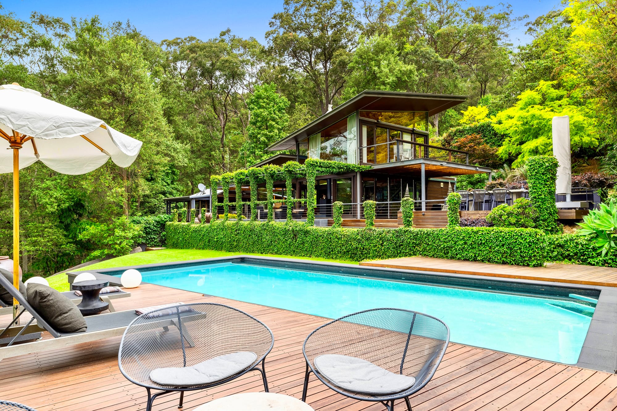 Dadirri Retreat showing the exterior with the pool and deck in the foreground