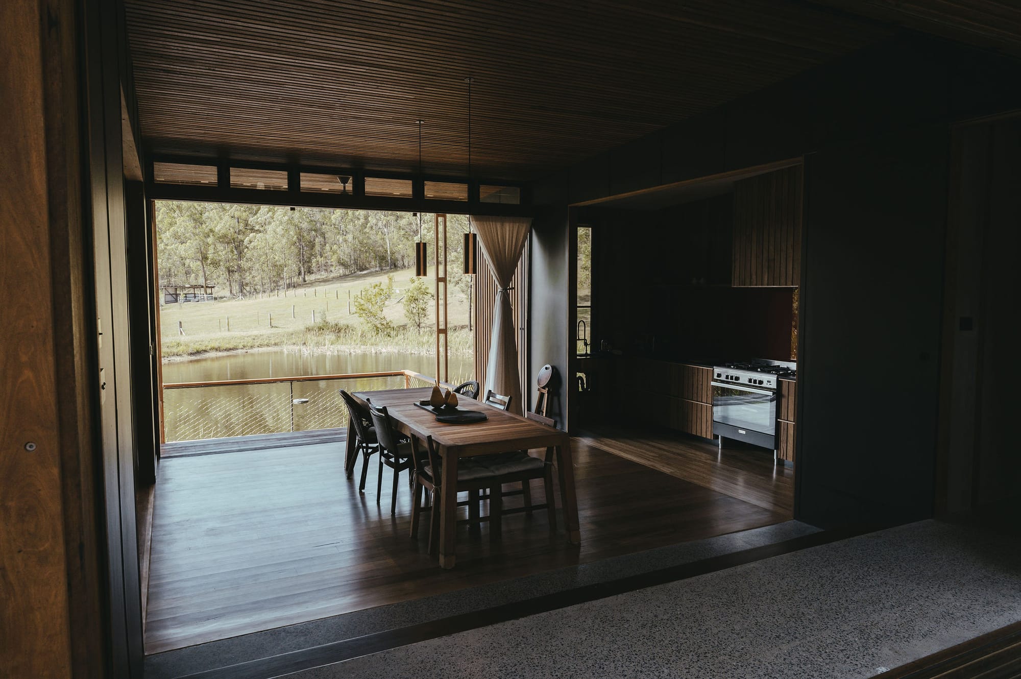 An interior shot of the dining room showing the exterior and interior connection.