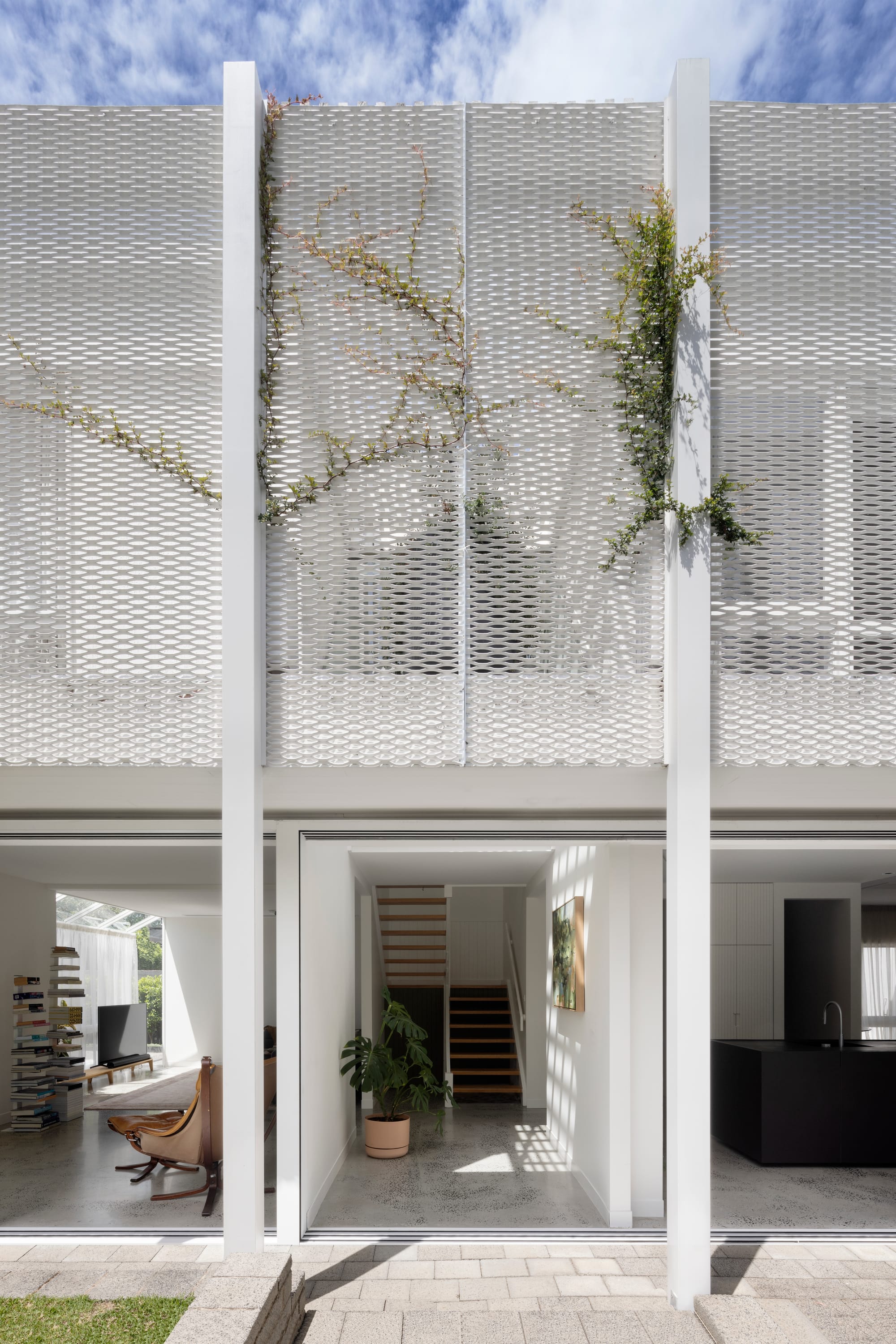 Beaumaris by Rachcoff Vella Architecture showing the external white screen and entry to the house.