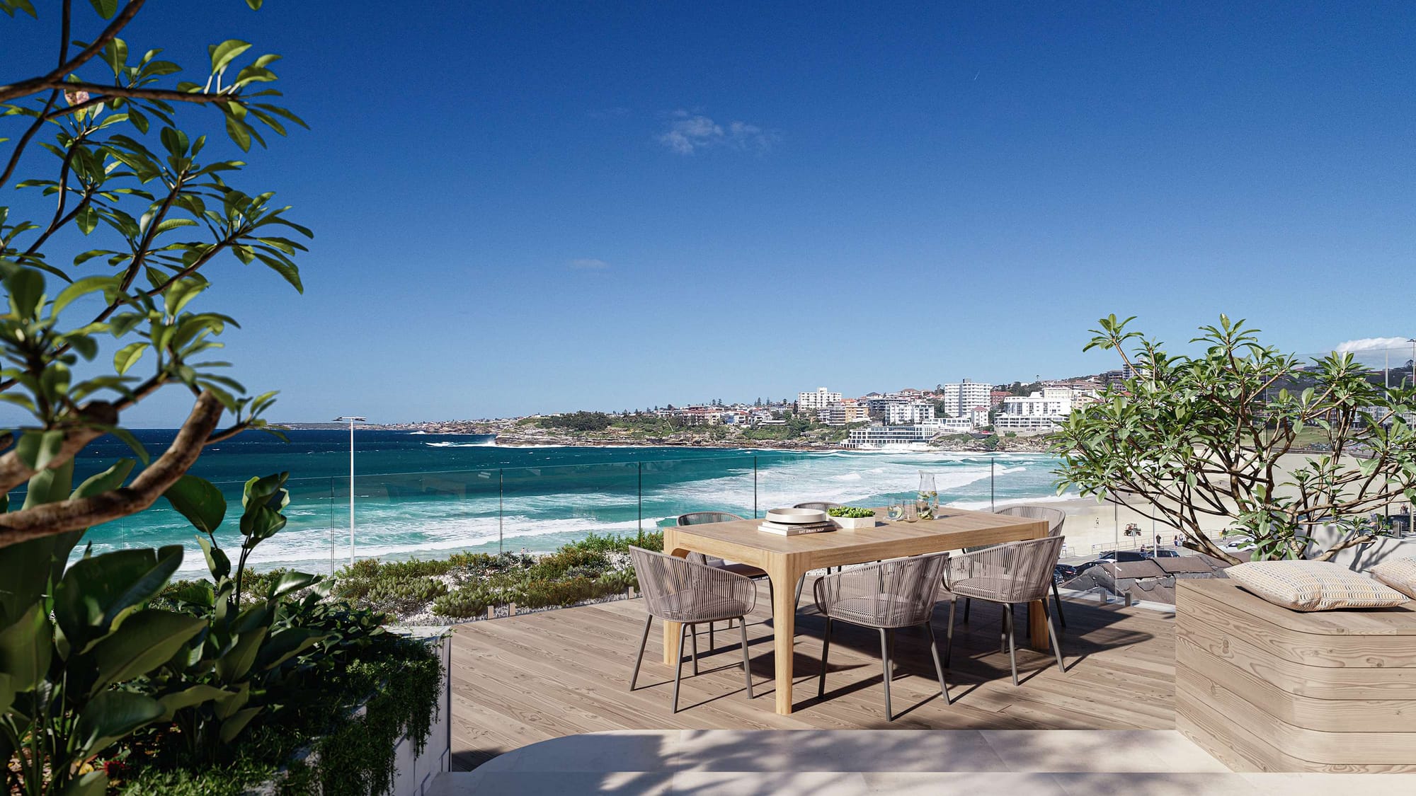 Oceanfront terrace with outdoor dining setting and coastal views, showcasing luxury home renovation in Sydney