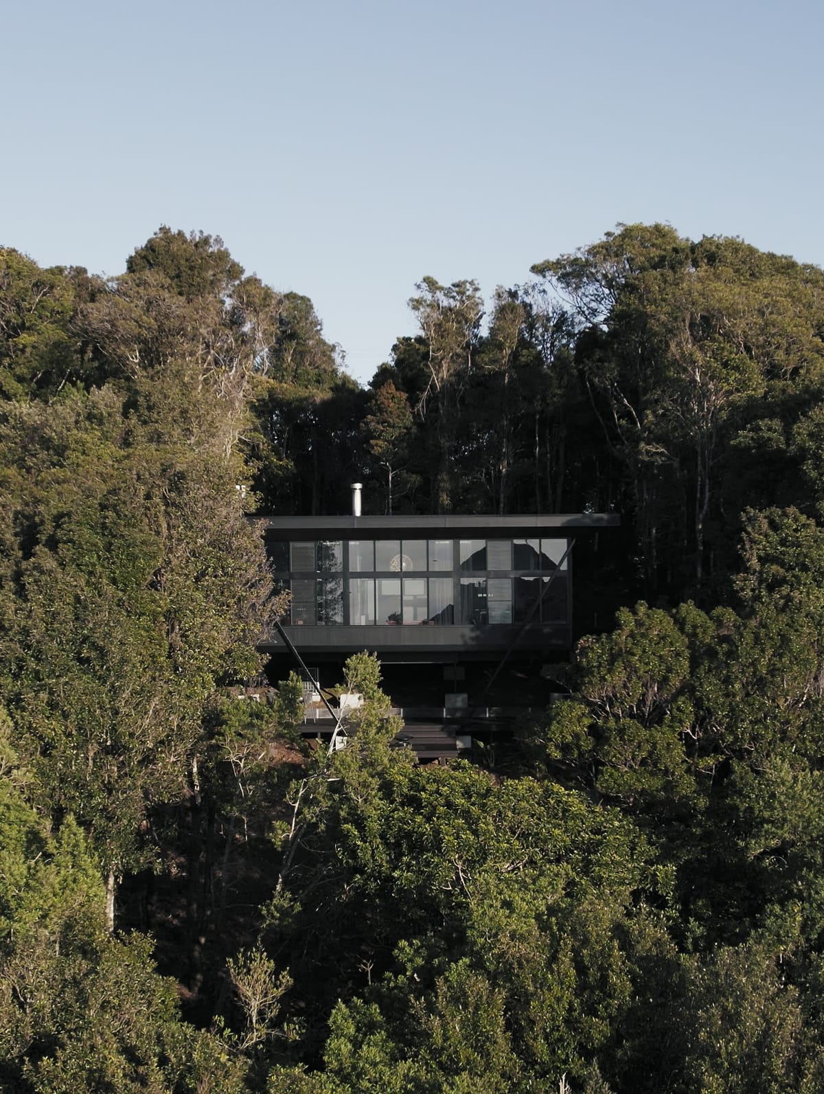 Cloudview Springbrook by Paul Uhlmann Architects. Photography by Ravens at Odds. Aerial image of black, contemporary h