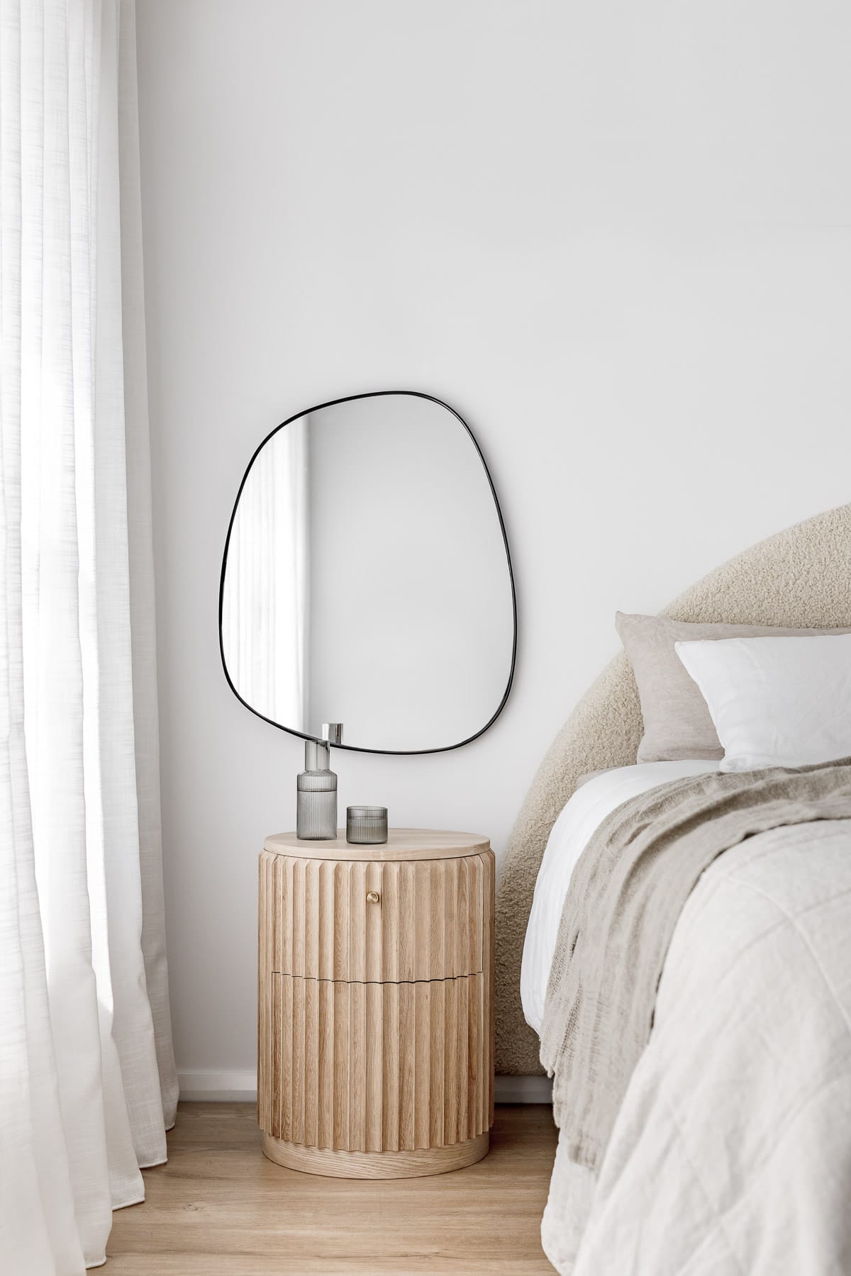 Showing the Underline Bedside Table by Hegi Design House styled in a bedroom