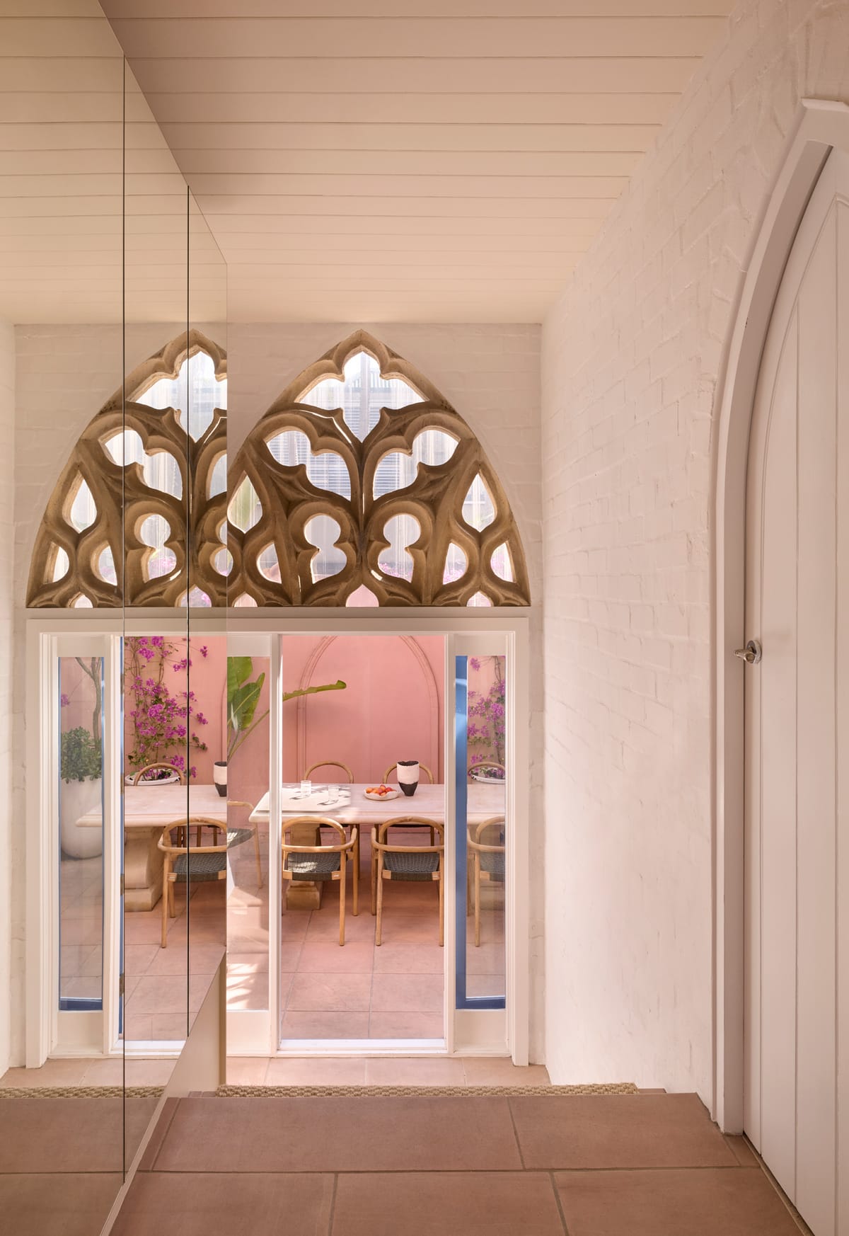 Chapel House by FUENISHD. Photography by Alicia Taylor. Gothic arched doorway.